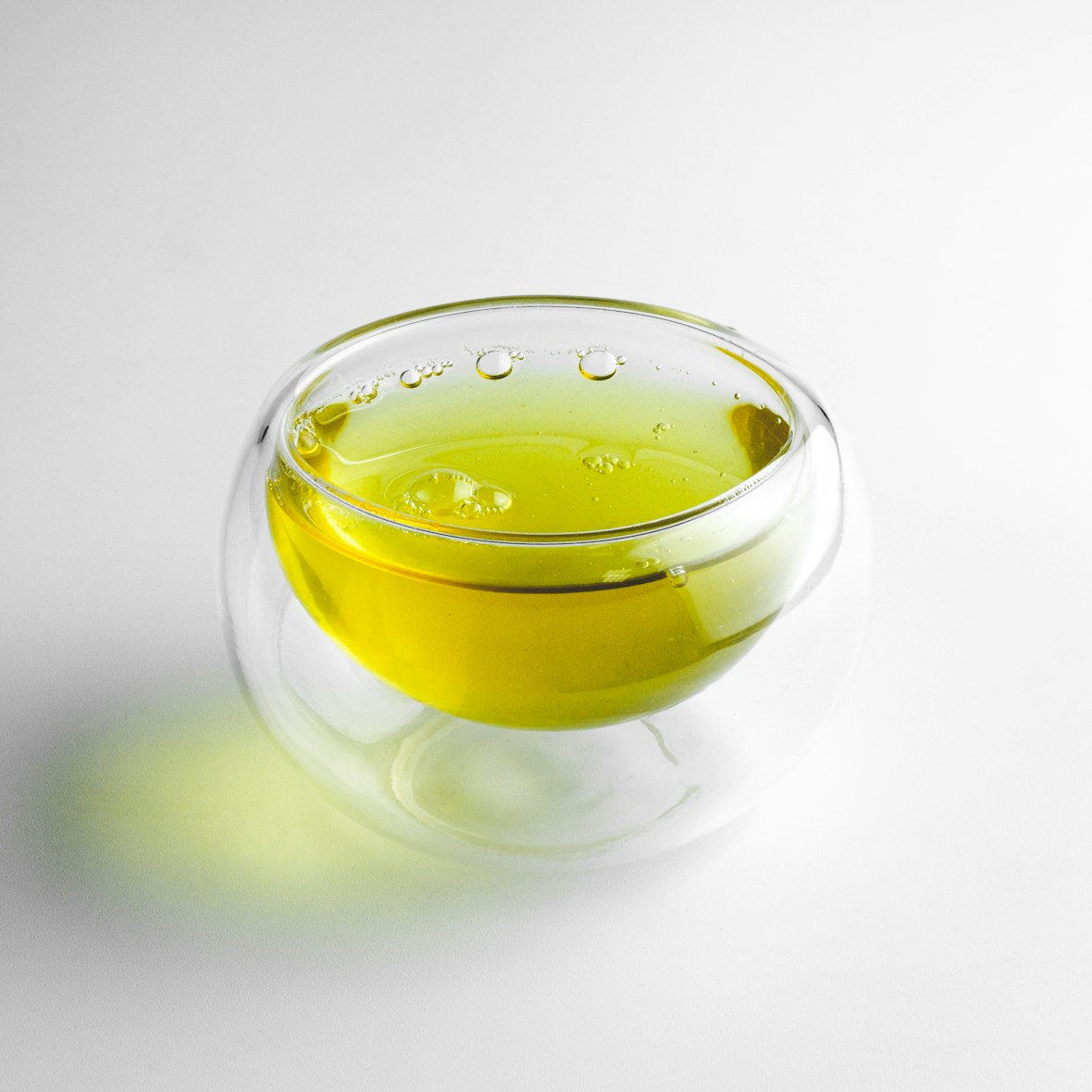 Olive oil in clear glass